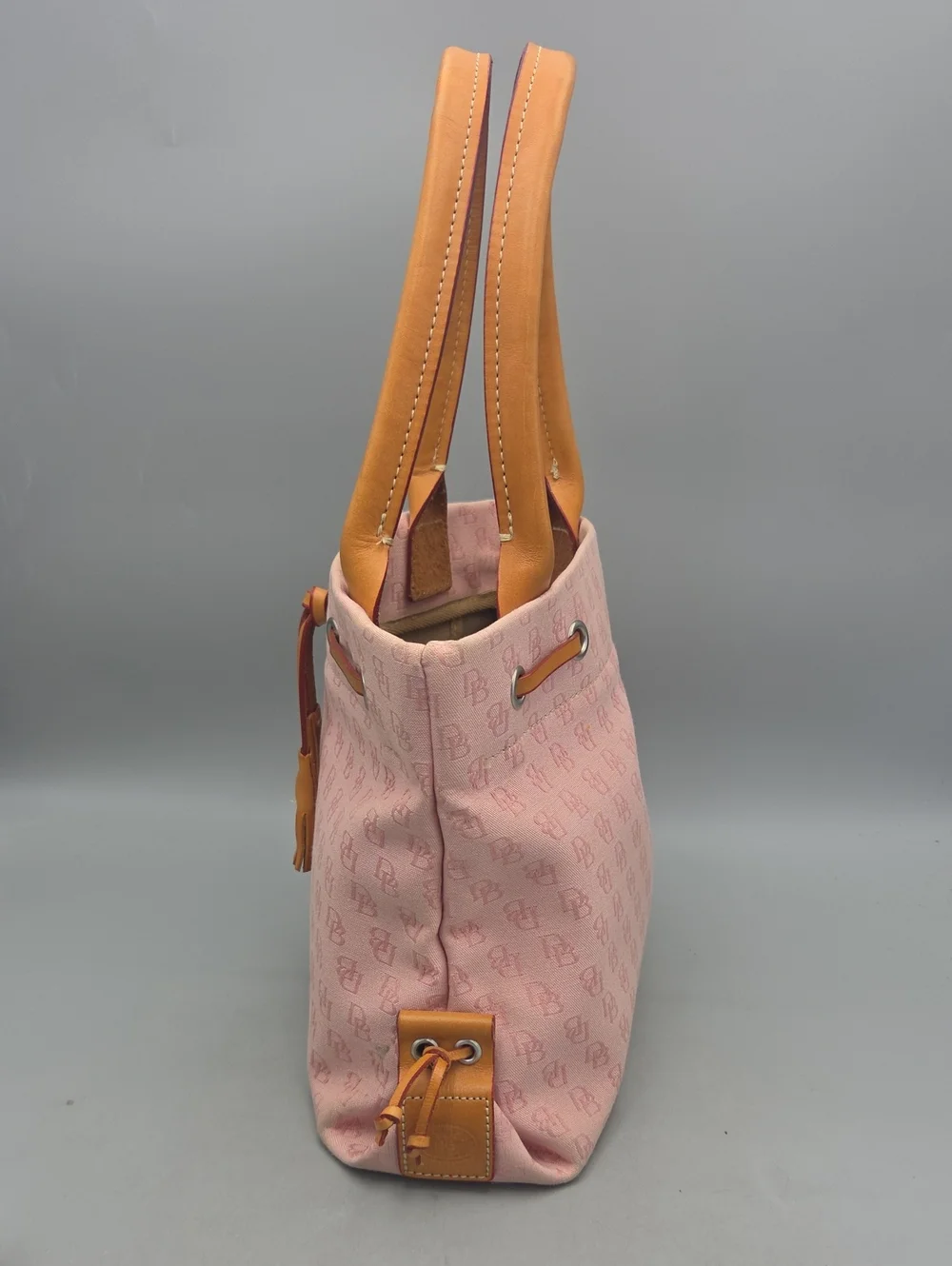 Dooney Bourke DB Monogram Drawstring Tote Canvas Leather Tassel Pink